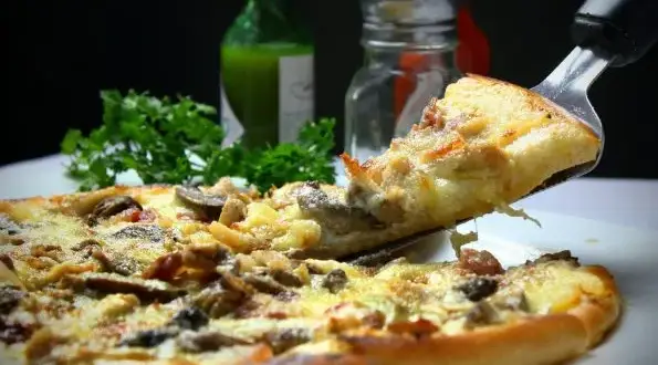 Jak idealnie upiec pizzę Guseppe: temperatura i czas pieczenia